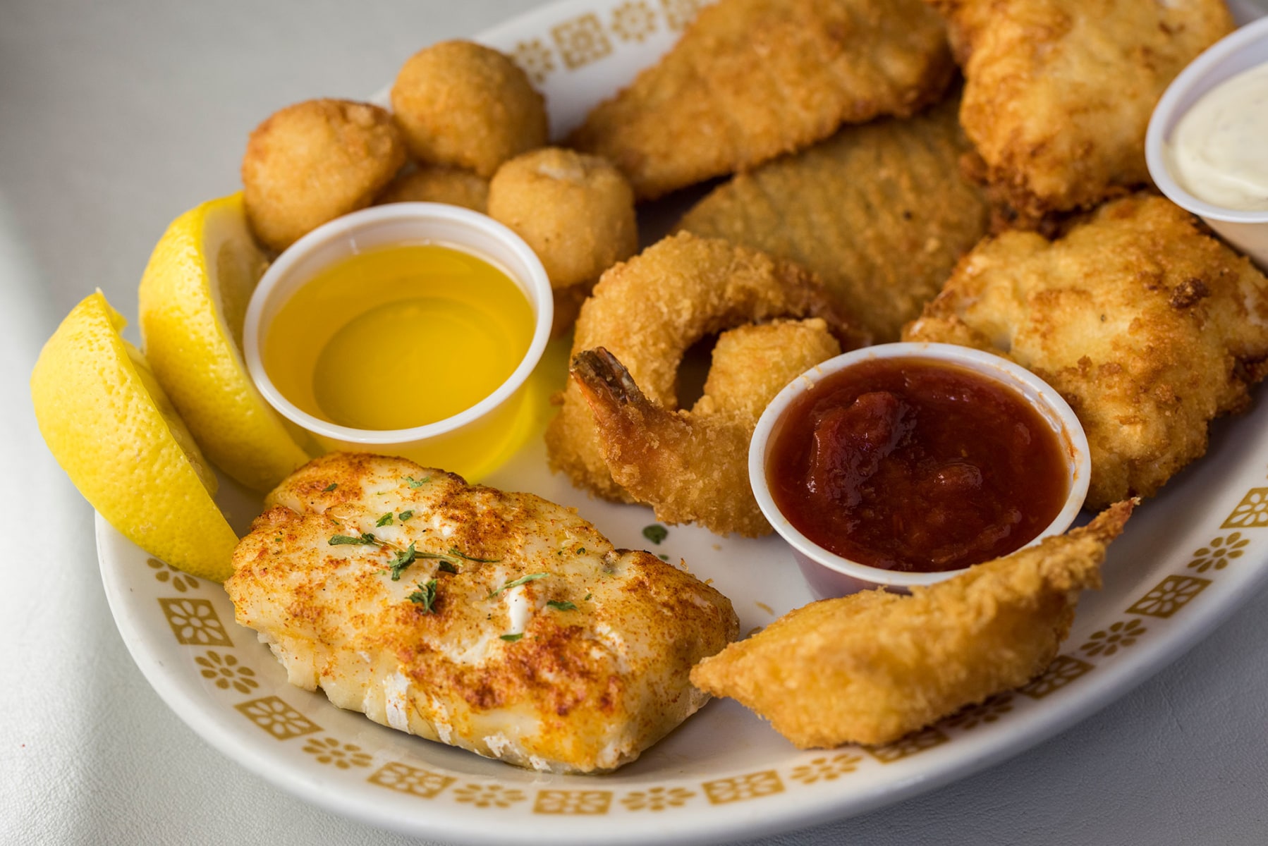 Clifford's all-you-can-eat Friday Fish Fry platter with cod, onion rings and tartar sauce